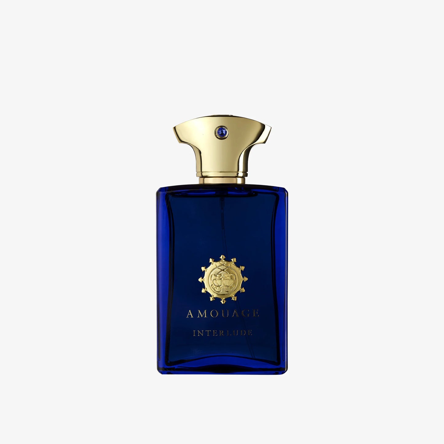 Blaues Parfüm Flakon von Amouage Interlude Man mit goldenem Deckel