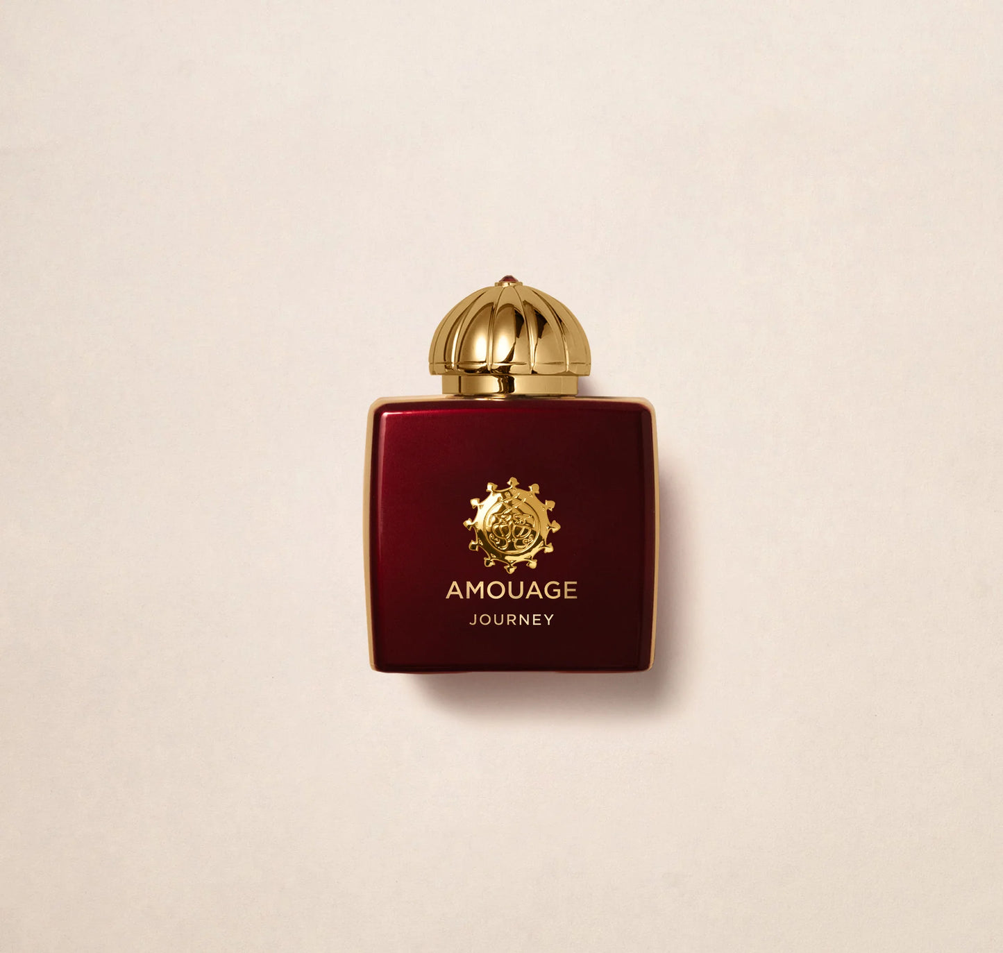 Rotes Parfüm Flakon von Amouage Journey Woman mit goldenem Deckel