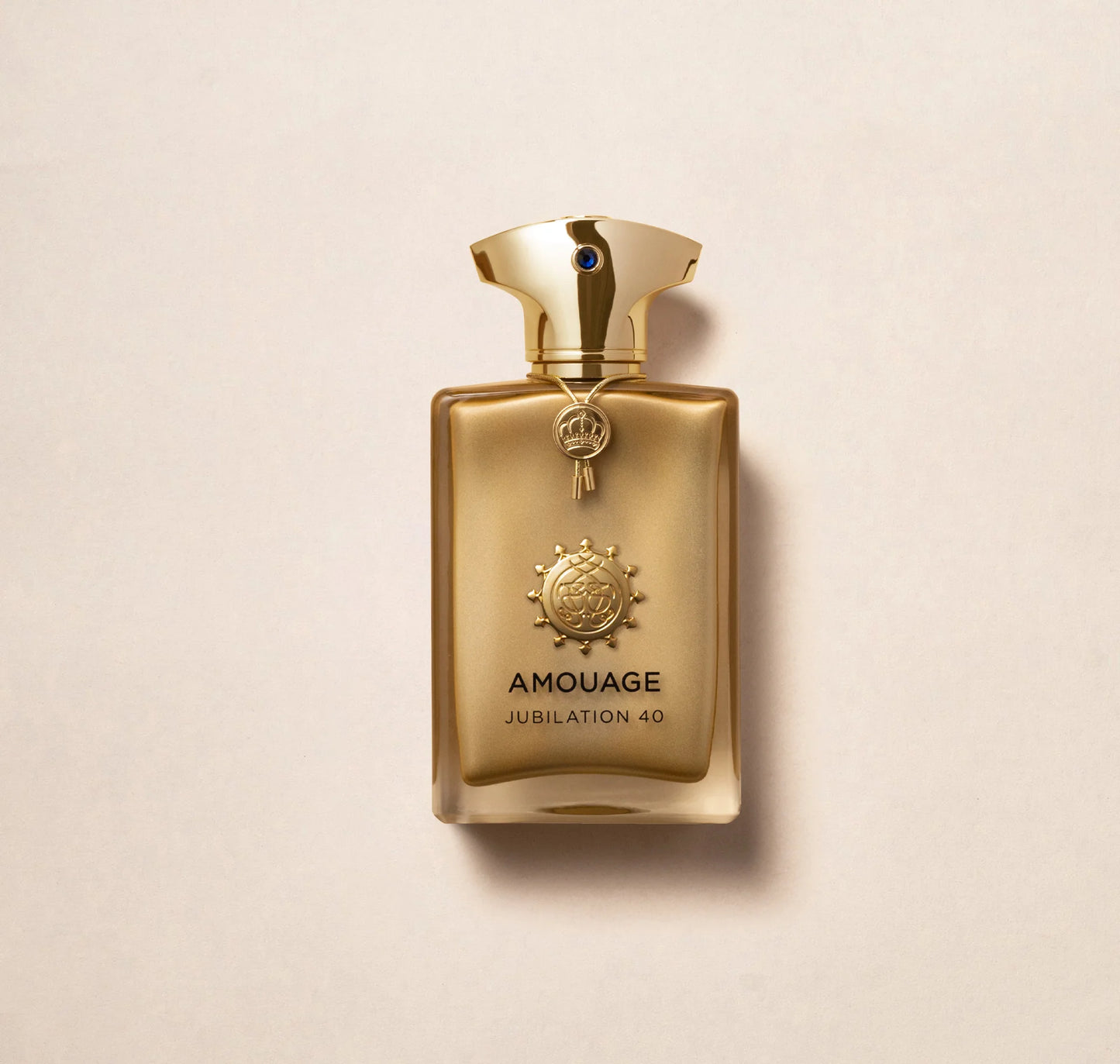 Goldenes Parfüm Flakon von Amouage Jubilation 40 Man mit goldenem Deckel