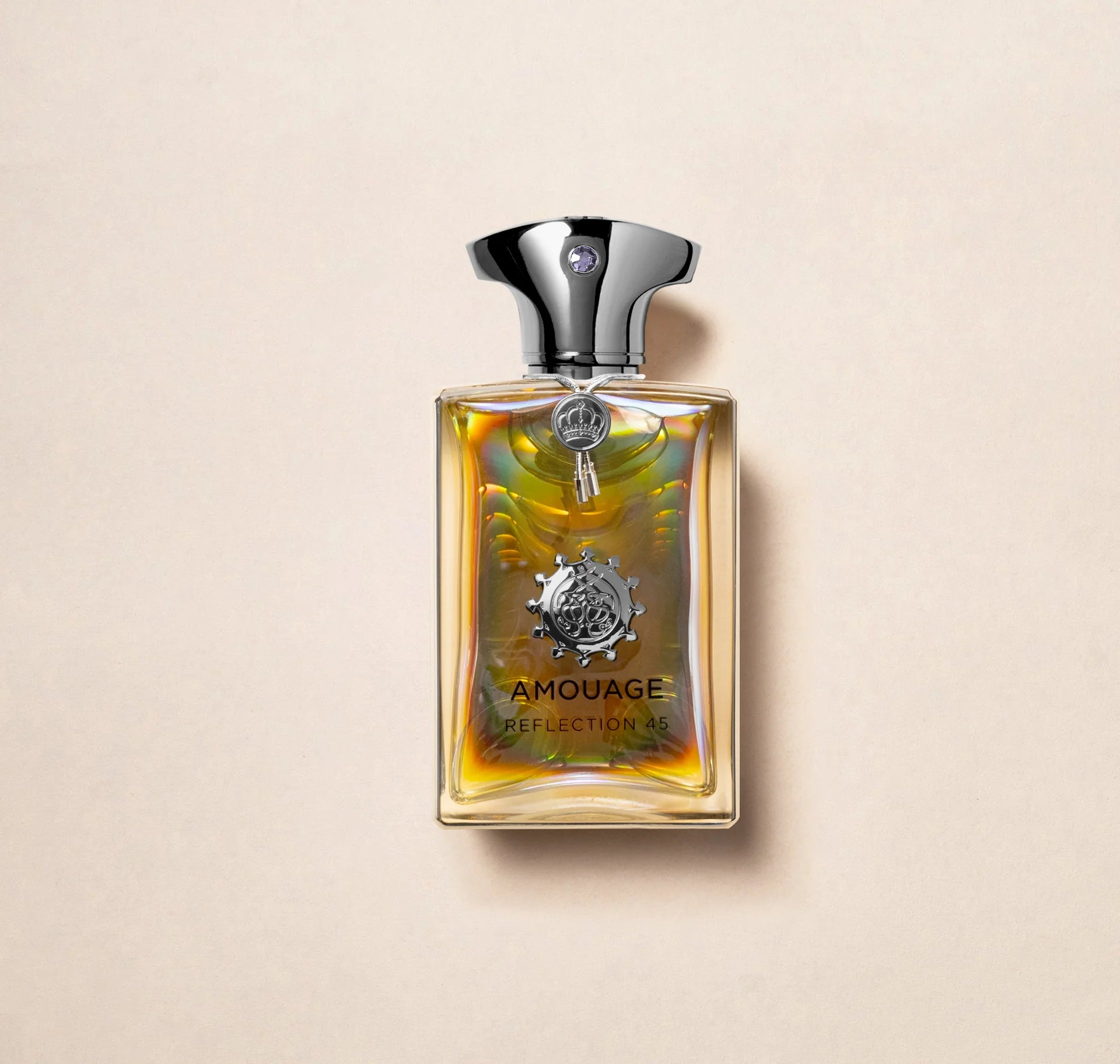 Durchsichtiges Parfüm Flakon von Amouage Reflection 45 Man mit chrom silbernem Deckel