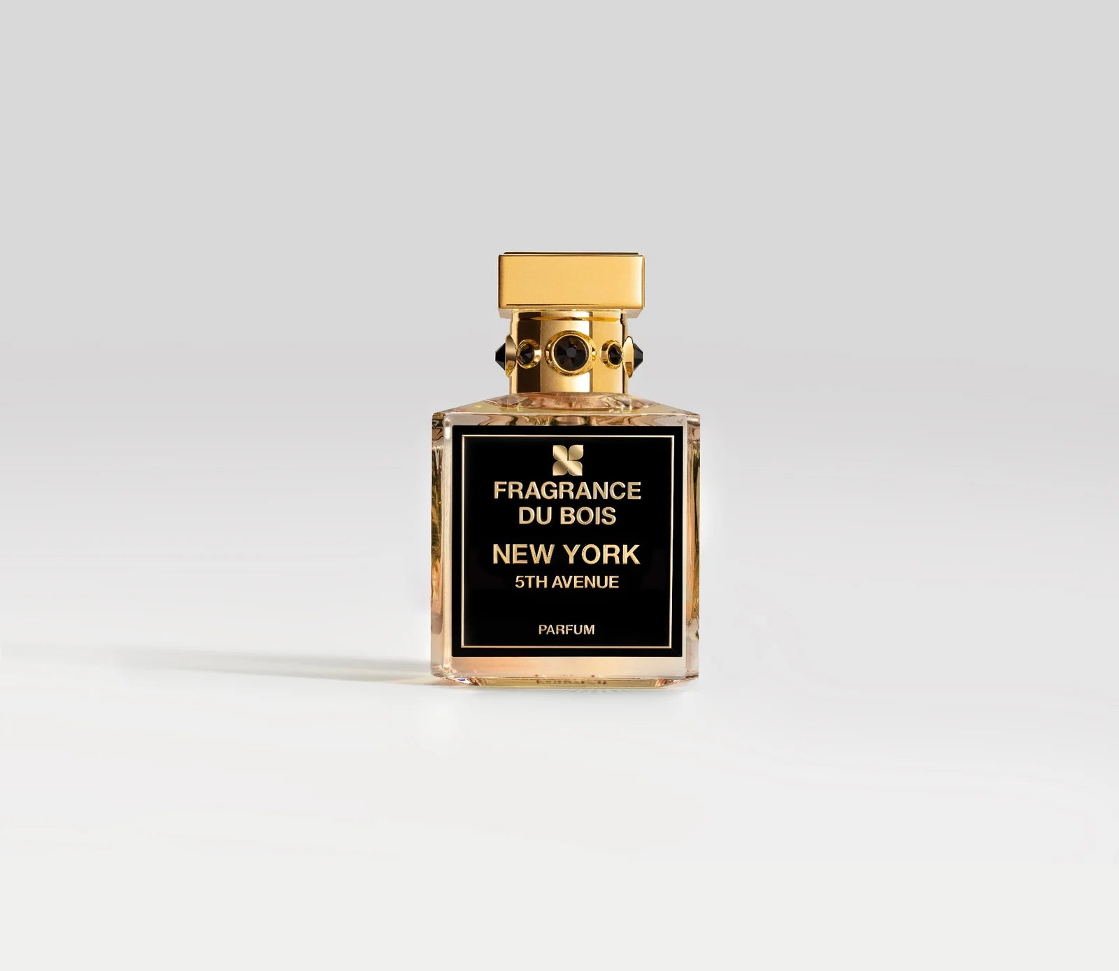 Transparentes Parfüm Flakon von Fragrance Du Bois New York 5th Avenue mit goldenem Deckel